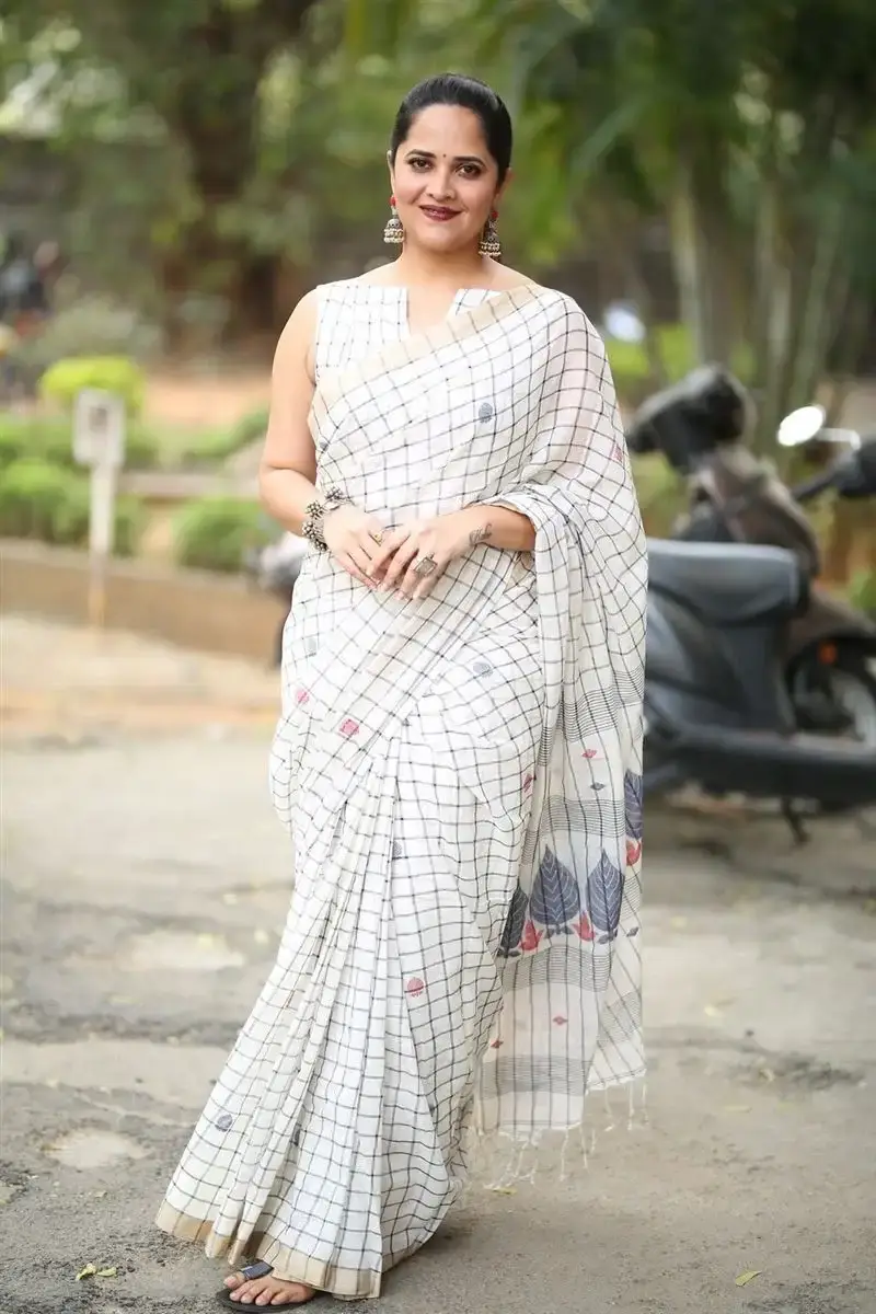 Anasuya Bharadwaj in White Saree at Razakar Movie Launch